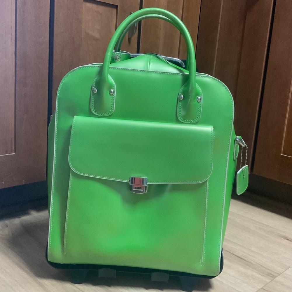 McKlein green leather roller traveling, computer bag, briefcase.